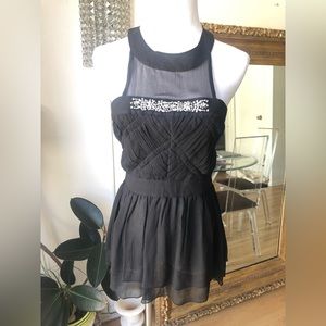 Single brand black silk sleeveless blouse with shiny stones size small
